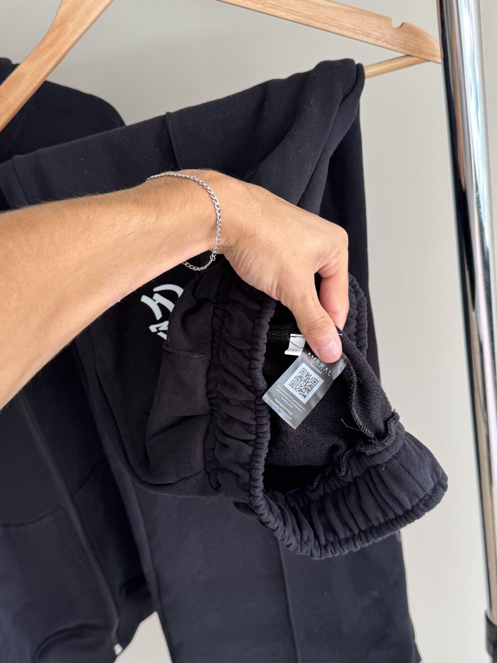 Custom Amaral Factory branded woven label with QR code